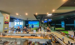 Bar and Indoor Golf at X-Golf Portland. Photo Credit: Lauren Whitney