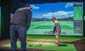 Indoor Golf Simulator at X-Golf Portland. Photo Credit: Lauren Whitney