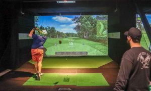Indoor Golf Simulator at X-Golf Portland. Photo Credit: Lauren Whitney