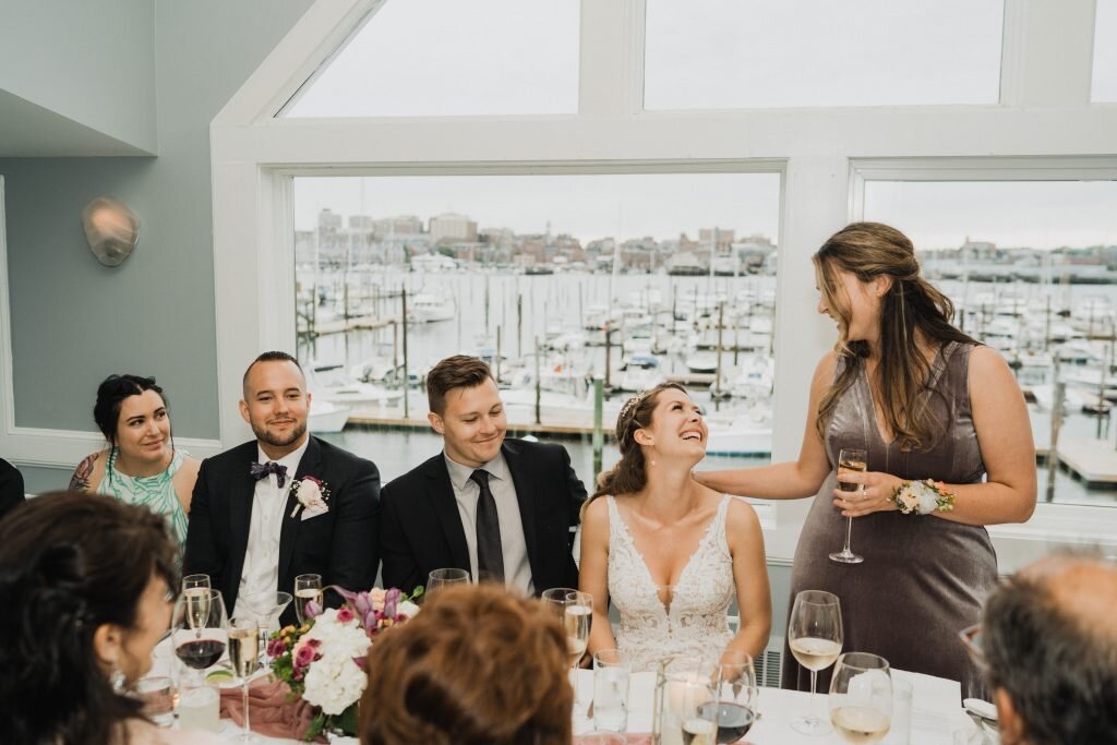 wedding party at dinner table - photo by The Camerados