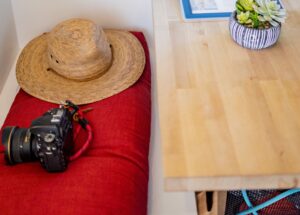 Camera on a couch. Photo credit: Capshore