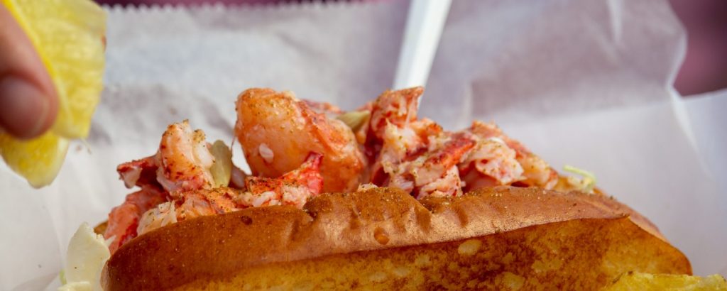 Bite into Maine Lobster rolls, Photo Credits: Serena Folding