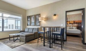 Double Queen Suite Living, Photo Credit: CS3 Photography