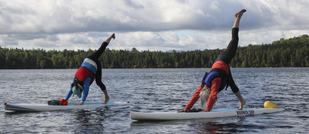 Stand up paddle boarding yoga, Photo Credit: P.J. Schwarz