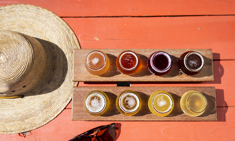 Hat, sunglasses and Kombucha flight, Photo Credit: Capshore Photography