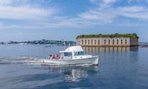 Boat Cruising on Casco Bay. Photo Credit: PGM Photography