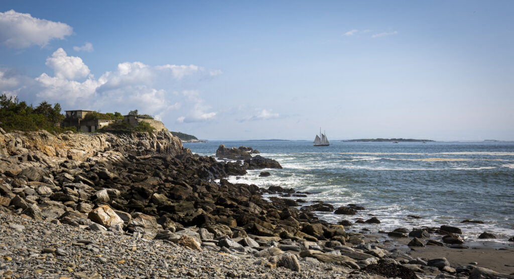 Sailboat off rocky coast Photo Credits: Serena Folding Sailboat off rocky coast Photo Credits: Serena Folding