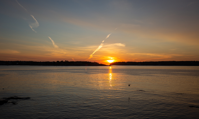 Sunset over water, Photo Credits: Serena Folding