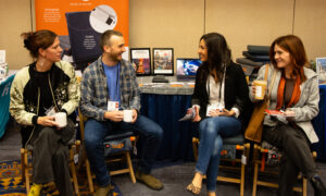 Huga members talking, Photo Credit: Focus Photography