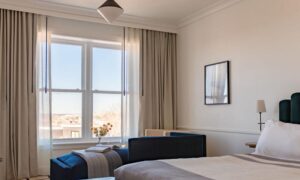 Longfellow Hotel Grand Standard with Back Cove Views room. Photo Credit: Carley Rudd Photography Longfellow Hotel Grand Standard with Back Cove Views room. Photo Credit: Carley Rudd Photography