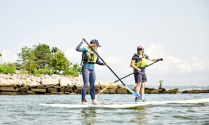 Paddle boarding duo, Photo credit: Lone Spruce Creative, courtesy of Maine Office of Tourism