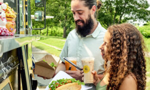 Couple getting food, Photo credit: Lone Spruce Creative, courtesy of Maine Office of Tourism