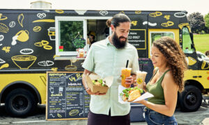 Couple at food truck, Photo credit: Lone Spruce Creative, courtesy of Maine Office of Tourism