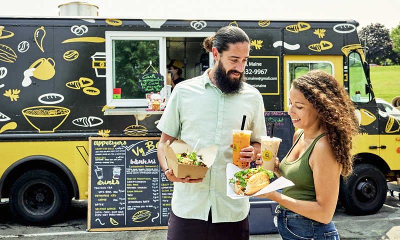 Couple at food truck, Photo credit: Lone Spruce Creative, courtesy of Maine Office of Tourism