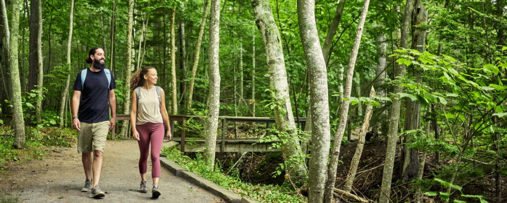 Couple walking on trail, Photo credit: Lone Spruce Creative, courtesy of Maine Office of Tourism