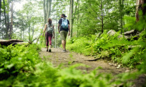 Couple on hiking trail, Photo credit: Lone Spruce Creative, courtesy of Maine Office of Tourism