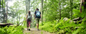 Couple on hiking trail, Photo credit: Lone Spruce Creative, courtesy of Maine Office of Tourism