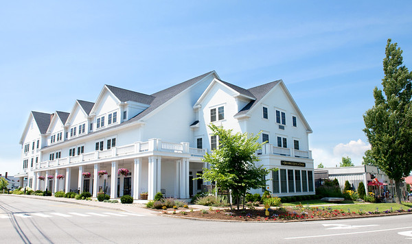 Hotel exterior with flowers + hanging plants, Photo Credit: The Brunswick Hotel