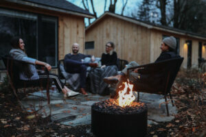 Guests by Firepit at AWOL Kennebunkport Photo Credi: Maiike Bernstrom