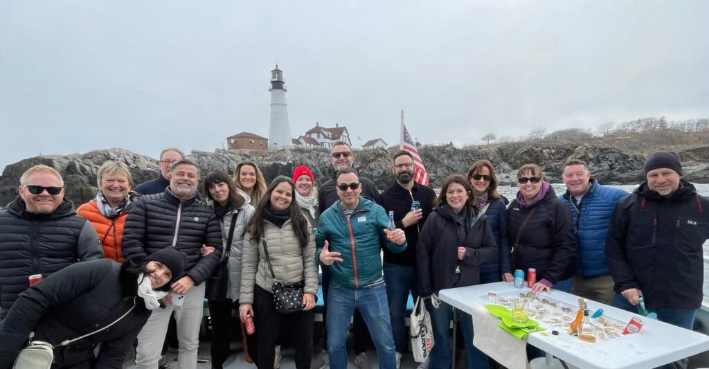 Group on Fogg's Boat at PHL. Photo Credit: Visit Portland