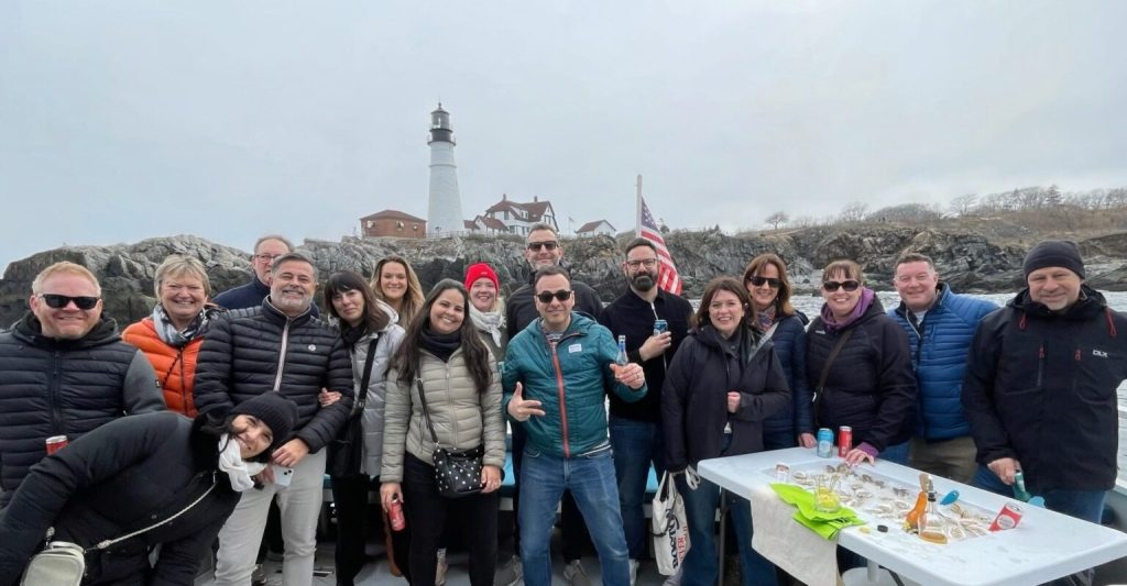 Group on Fogg's Boat at PHL. Photo Credit: Visit Portland