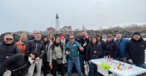 Group on Fogg's Boat at PHL. Photo Credit: Visit Portland