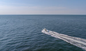 Fore River Sportfishing cruising on water, Photo Credit: PGM Photography