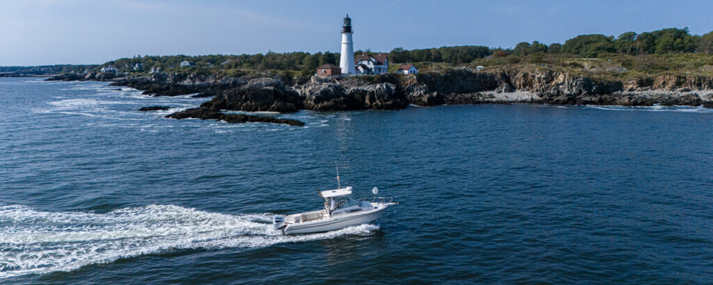Fore River Sportfishing cruising on water, Photo Credit: PGM Photography