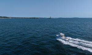 Fore River Sportfishing cruising on water, Photo Credit: PGM Photography