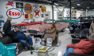 People sitting at Maine Classic Car Museum, Photo Credit: Lauren Peters at Visit Portland