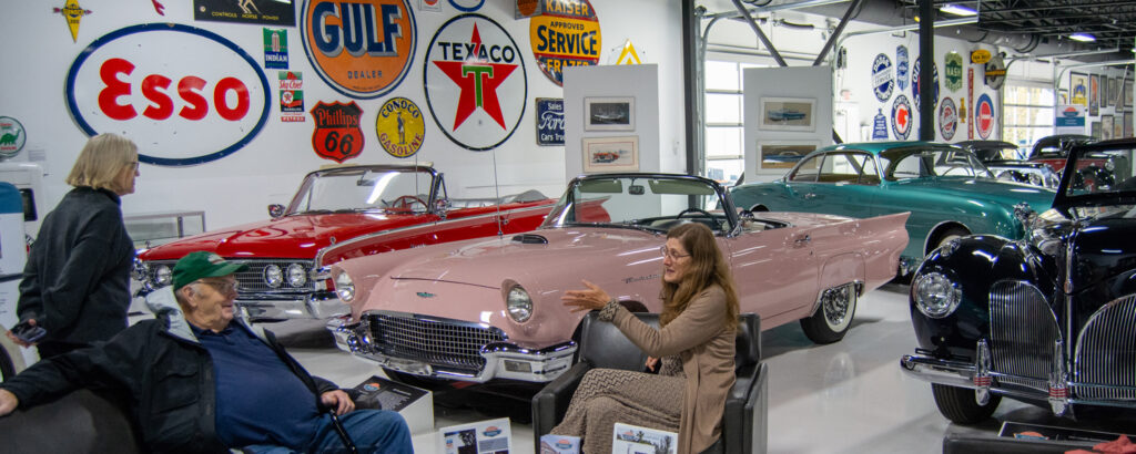 People sitting at Maine Classic Car Museum, Photo Credit: Lauren Peters at Visit Portland