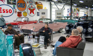 People sitting at Maine Classic Car Museum, Photo Credit: Lauren Peters at Visit Portland