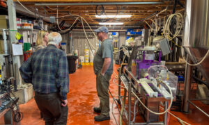 Brewer talking to small group, Photo Credit: Lauren Peters at Visit Portland