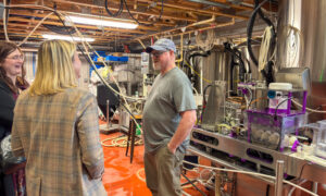 Brewer talking to small group, Photo Credit: Lauren Peters at Visit Portland