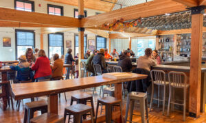 Dinning at Nonesuch Brewery, Photo Credit: Lauren Peters at Visit Portland