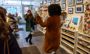 Women dancing in local shop; Photo Credit: Lauren Peters at Visit Portland