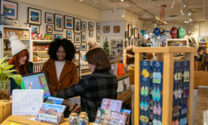 People shopping in Made in Maine; Photo Credit: Lauren Peters at Visit Portland