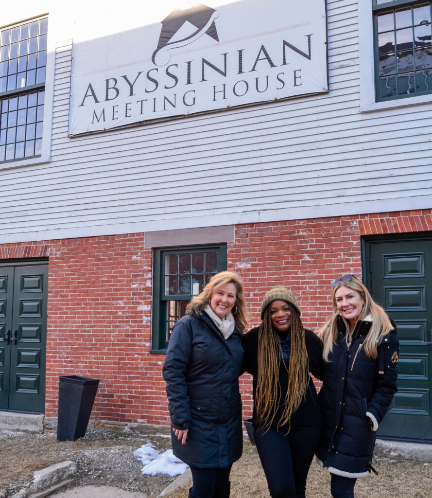 Friends outside the Abyssinian Meeting House, Photo Credit: Lauren Peters at Visit Portland