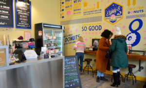 Socializing in donut store; Photo Credit: Lauren Peters at Visit Portland
