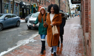 Friends walking in the Old Port; Photo Credit: Lauren Peters at Visit Portland