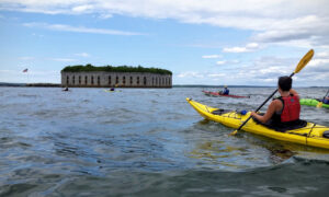 Kayaking by Fort Gorges. Photo Provided by Portland Paddle