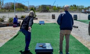 Corn Hole at Quarryside at Rock Row. Photo Credit: Lauren Peters / Visit Portland