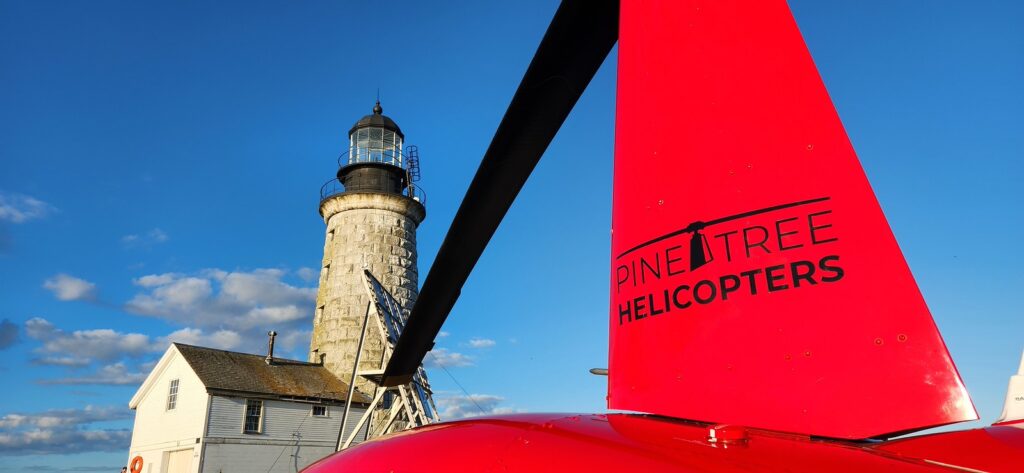 Helicopter at Lighthouse. Photo Credit: Pine Tree Helicopters Helicopter at Lighthouse. Photo Credit: Pine Tree Helicopters