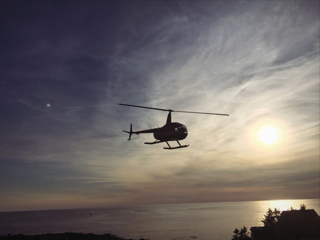 Helicopter flying. Photo Credit: Pine Tree Helicopters Helicopter flying. Photo Credit: Pine Tree Helicopters
