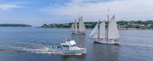 Yacht Charters past two sailboats; Photo Credit: Peter G. Morneau Photography