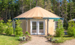 Exterior Acadia Wilderness Lodge brown yurt; Photo Credit: Peter G. Morneau Photography