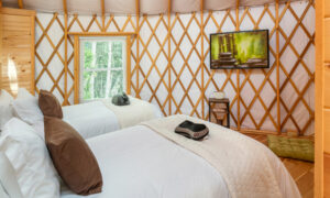 Acadia Wilderness Lodge yurt luxury double bedroom; Photo Credit: Peter G. Morneau Photography