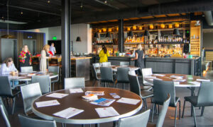 Media presentation at restaurant and bar setup; Photo Credit: Lauren Peters at Visit Portland