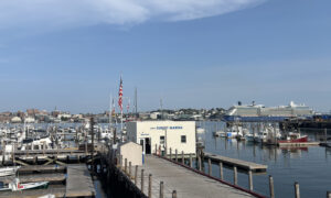 Large cruise ship in Portland Harbor; Photo Credit: Lauren Peters at Visit Portland