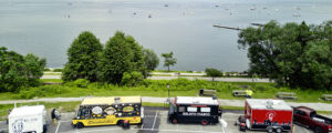 Food trucks parked by ocean; Photo courtesy of Maine Office of Tourism